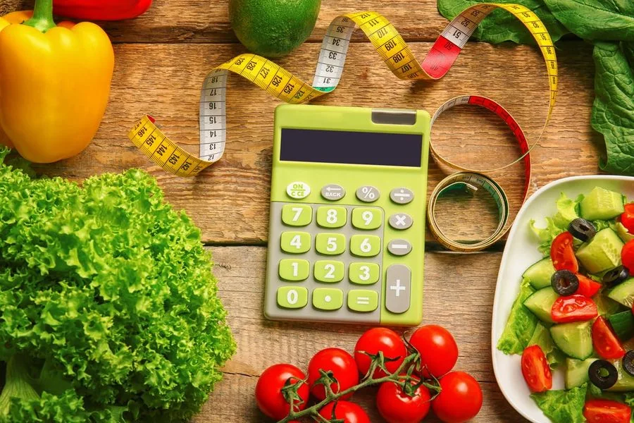 Vegetables, a tape measure and a calculator